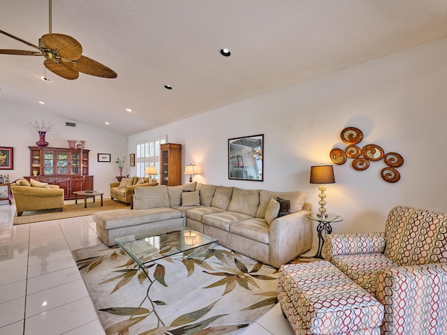 living room with tile patterned floors, recessed lighting, a textured ceiling, and vaulted ceiling