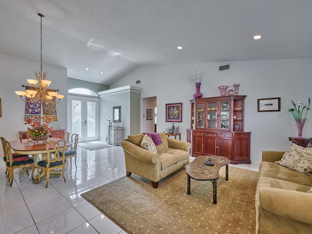 living area with visible vents, vaulted ceiling, light tile patterned floors, french doors, and a textured ceiling