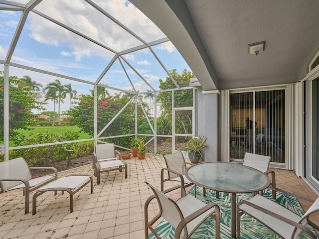 view of patio / terrace with a lanai