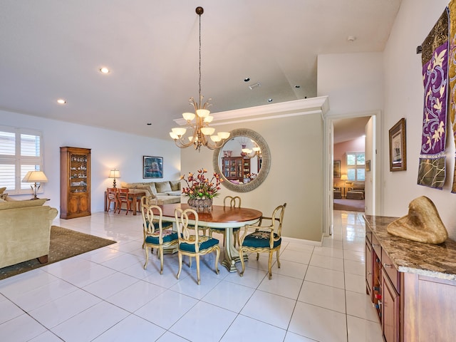 dining room with light tile patterned floors, a chandelier, and recessed lighting