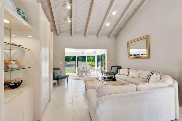 living area featuring wooden ceiling, rail lighting, beamed ceiling, and light tile patterned floors