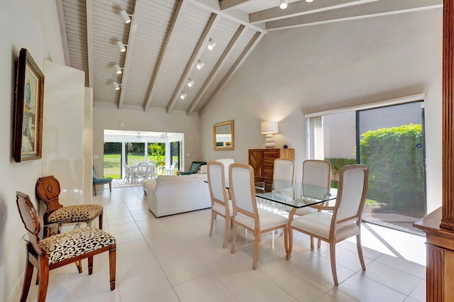 dining space featuring light tile patterned floors, high vaulted ceiling, wooden ceiling, beamed ceiling, and track lighting