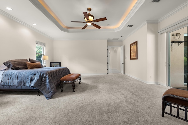 bedroom featuring baseboards, a raised ceiling, carpet, and visible vents