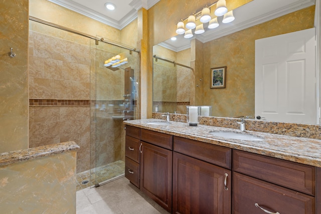 bathroom featuring a shower stall, ornamental molding, double vanity, and a sink