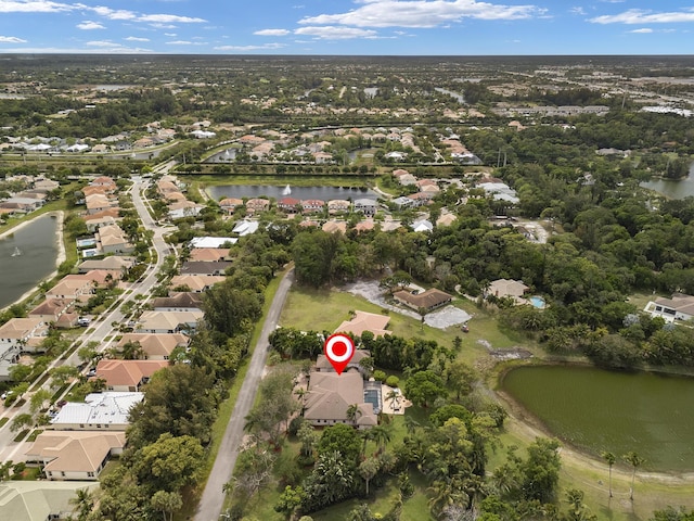 aerial view with a residential view and a water view