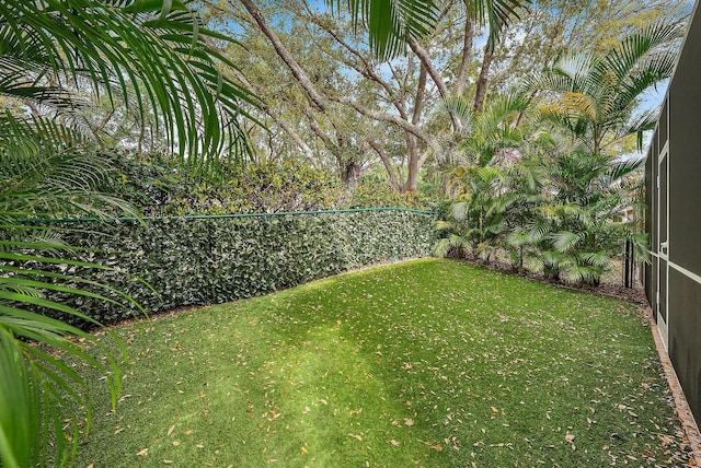 view of yard with fence