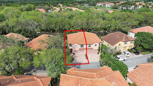 birds eye view of property with a residential view