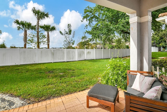 view of yard featuring a fenced backyard and a patio