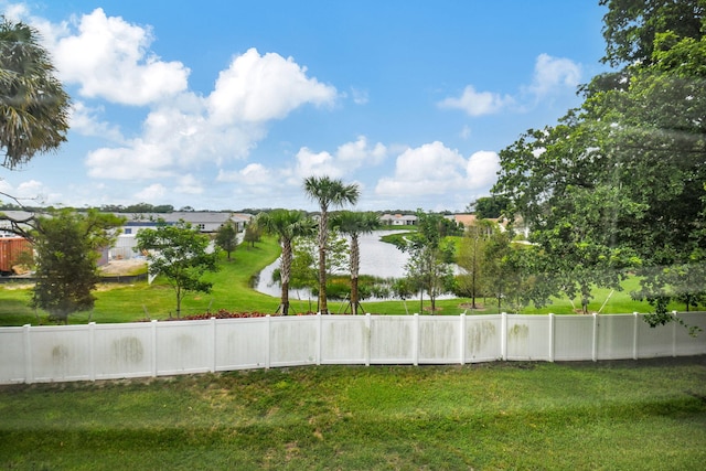 view of water feature with fence