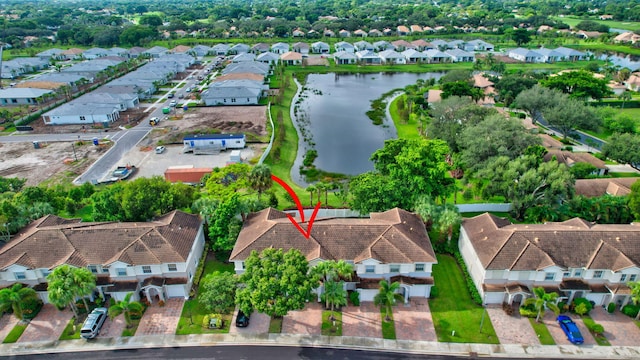 aerial view featuring a water view and a residential view