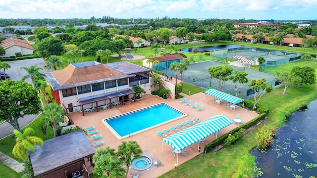 bird's eye view with a water view