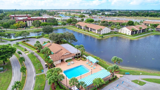 drone / aerial view with a water view