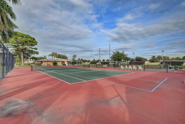 view of sport court with community basketball court and fence