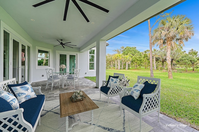 view of patio / terrace with a ceiling fan, outdoor dining space, french doors, and outdoor lounge area