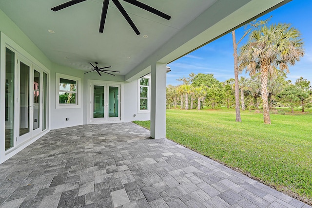 view of patio with ceiling fan and french doors