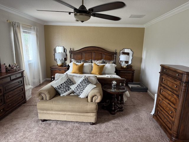 bedroom featuring visible vents, ornamental molding, light carpet, ceiling fan, and baseboards