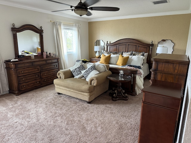 bedroom with light carpet, ornamental molding, visible vents, and a ceiling fan