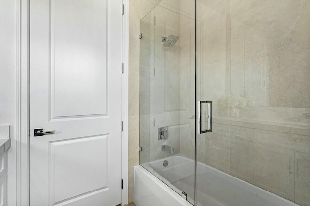 full bathroom with combined bath / shower with glass door