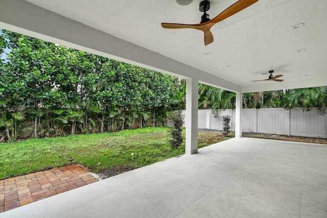 view of patio / terrace featuring a fenced backyard and a ceiling fan