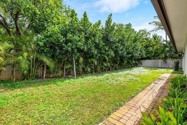 view of yard with a fenced backyard