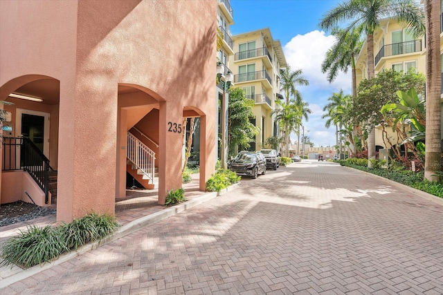 surrounding community featuring stairs