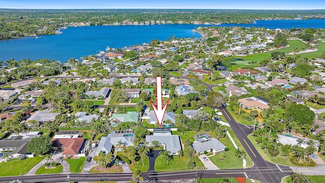 aerial view with a water view and a residential view