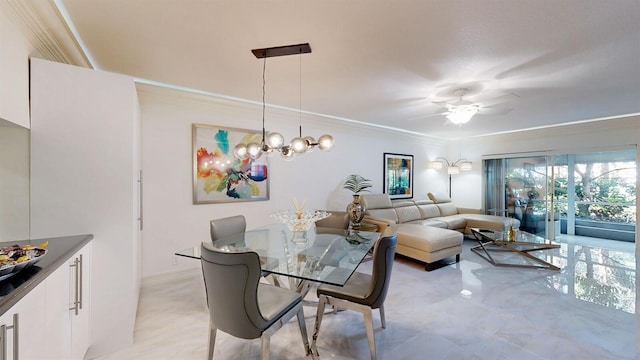 dining area with ornamental molding and ceiling fan with notable chandelier