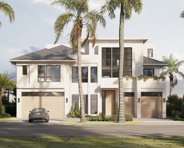 748 NE 72nd St, Boca Raton, FL 33487 - contemporary home with stucco siding, a garage, a standing seam roof, a metal roof, and driveway