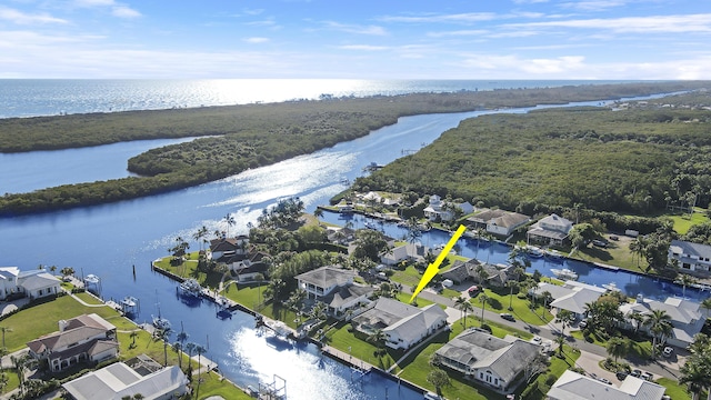 8579 SE Sabal St, Hobe Sound, FL 33455 - aerial perspective of suburban area featuring a nearby body of water