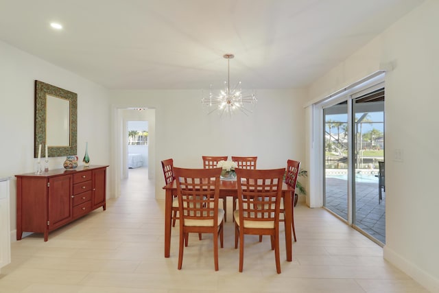 8579 SE Sabal St, Hobe Sound, FL 33455 - dining space featuring healthy amount of natural light, a chandelier, and recessed lighting