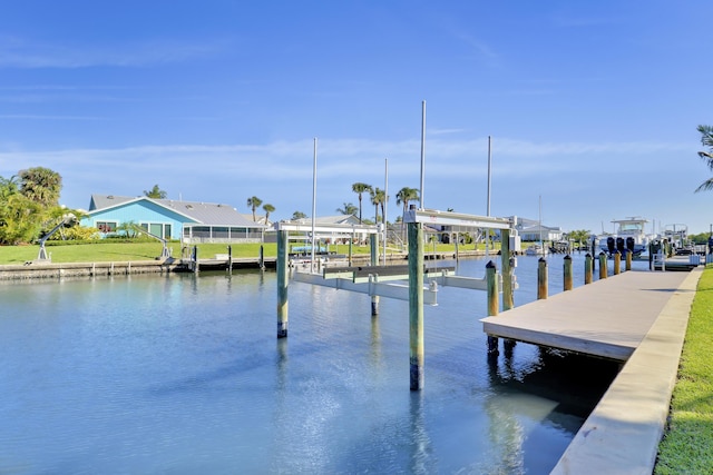 8579 SE Sabal St, Hobe Sound, FL 33455 - dock area featuring boat lift and a water view
