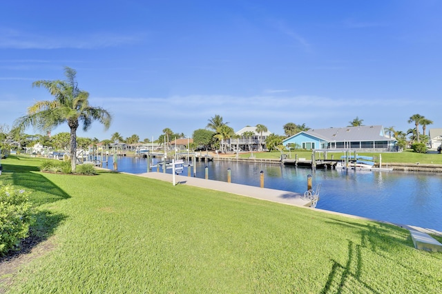 8579 SE Sabal St, Hobe Sound, FL 33455 - water view featuring a dock and nearby suburban area
