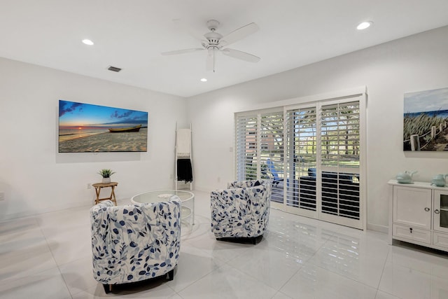 living area featuring a ceiling fan, recessed lighting, and visible vents