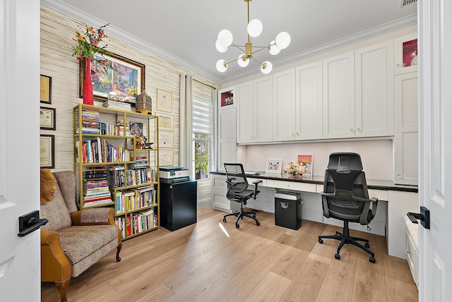 office space featuring an inviting chandelier, light wood-style floors, visible vents, and ornamental molding