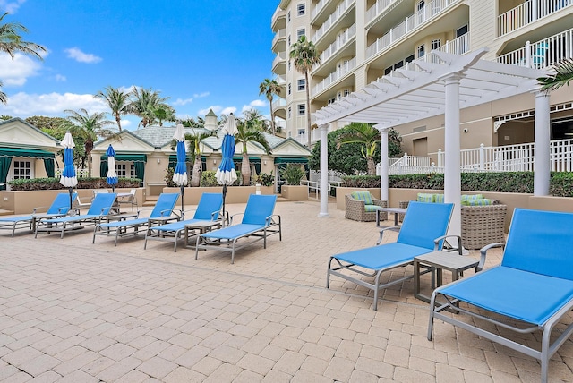 view of patio featuring a pergola