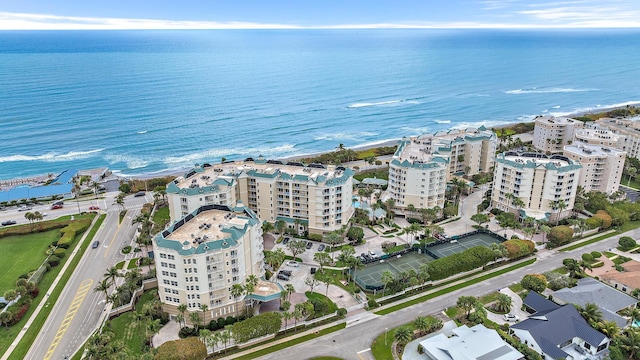 aerial view featuring a view of city and a water view