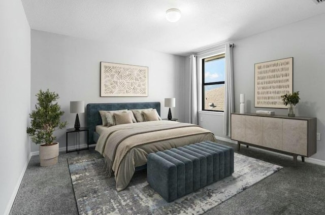 carpeted bedroom with a textured ceiling and baseboards