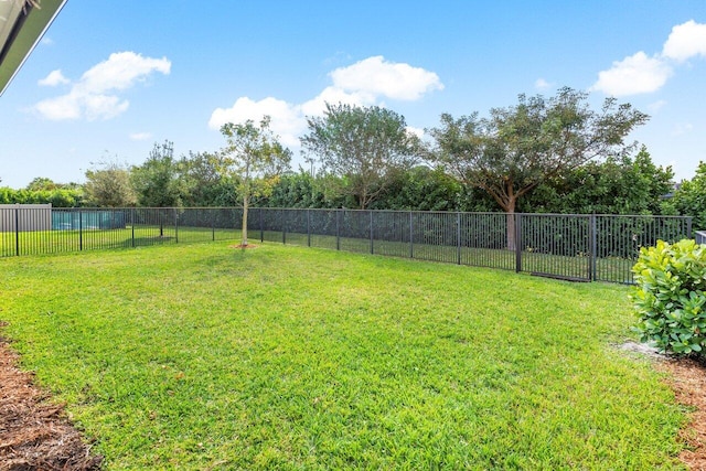 view of yard with fence