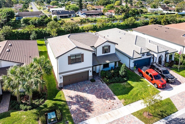 birds eye view of property with a residential view