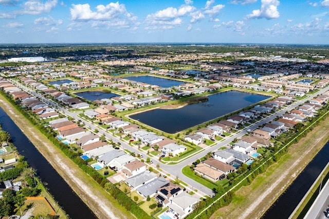 aerial view with a residential view and a water view