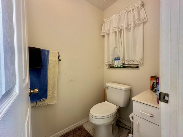 413 European Ln, Fort Pierce, FL 34982 - bathroom with tile patterned floors, toilet, and baseboards