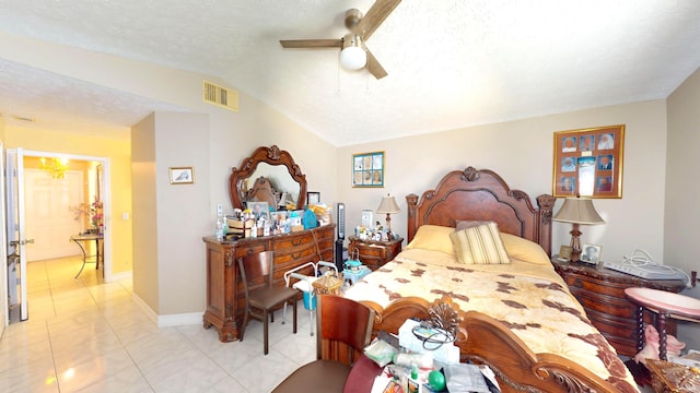 413 European Ln, Fort Pierce, FL 34982 - bedroom featuring visible vents, a textured ceiling, light tile patterned floors, baseboards, and vaulted ceiling
