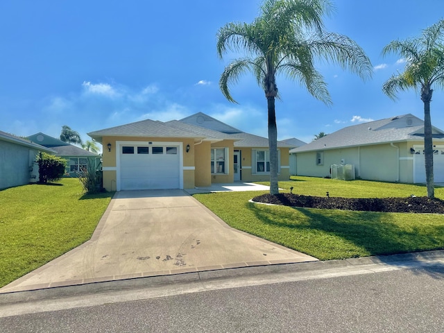413 European Ln, Fort Pierce, FL 34982 - ranch-style home featuring stucco siding, an attached garage, concrete driveway, and a front lawn