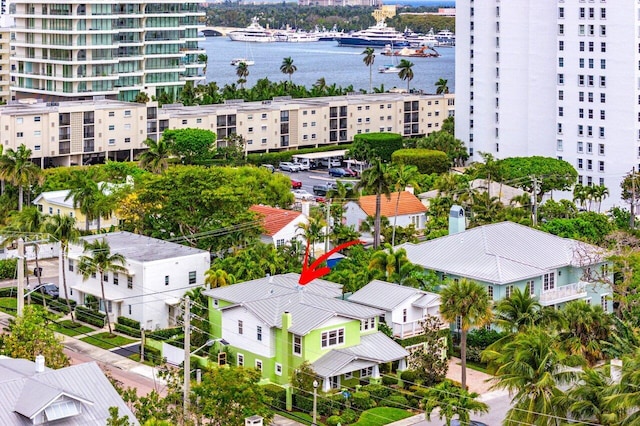 drone / aerial view with a water view