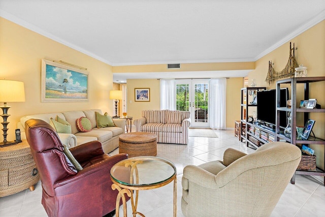 living area with light tile patterned floors, visible vents, crown molding, and french doors