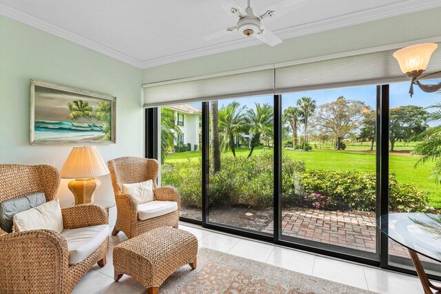 sunroom / solarium with ceiling fan