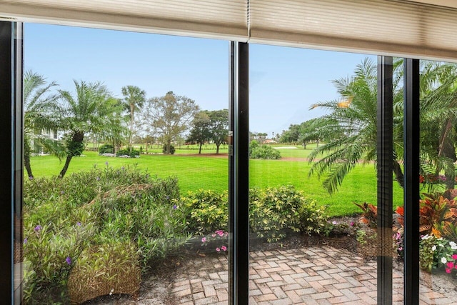 entryway with brick floor and a wealth of natural light