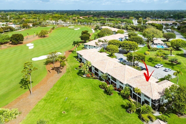 drone / aerial view featuring view of golf course