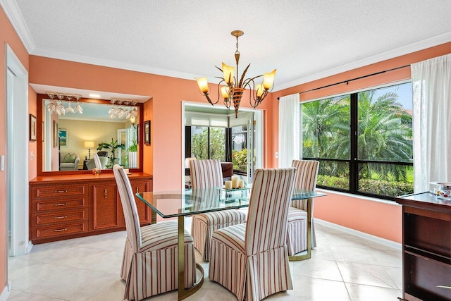 dining area with light tile patterned floors, ornamental molding, a chandelier, and a textured ceiling