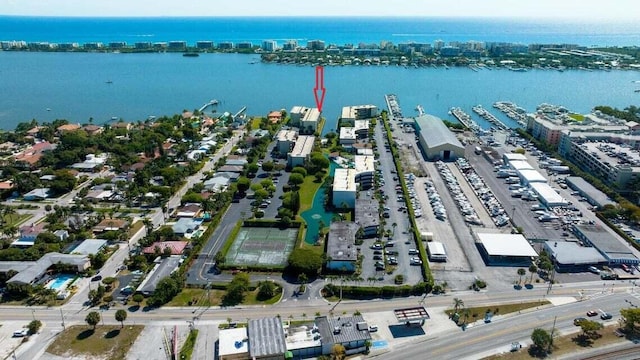 birds eye view of property featuring a water view